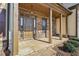 Inviting front porch with stone accents and a classic paneled front door at 70 Wentworth Ln, Villa Rica, GA 30180