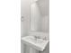 Close-up of a clean bathroom sink with a modern faucet, a large mirror, and a towel ring at 1106A Wedgewood Nw Dr, Atlanta, GA 30318