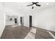 Bright and modern living room with wood floors, recessed lighting, and a ceiling fan for comfortable living at 1106A Wedgewood Nw Dr, Atlanta, GA 30318
