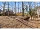 The property offers a spacious backyard, complemented by an enclosed sunroom at 1628 Links Overlook, Stone Mountain, GA 30088