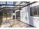 Enclosed sunroom boasts natural light and views with access to an outdoor patio at 1628 Links Overlook, Stone Mountain, GA 30088