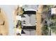 Aerial view of a well-maintained home showcasing its roof, landscaping, driveway, and surrounding neighborhood at 4916 Kentwood Dr, Marietta, GA 30068