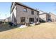 Spacious backyard with a patio perfect for entertaining, featuring seating and a well maintained lawn at 4916 Kentwood Dr, Marietta, GA 30068