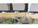 An overhead view of a backyard with a well-manicured lawn and a patio with outdoor seating at 4916 Kentwood Dr, Marietta, GA 30068