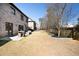 Large backyard with patio, perfect for outdoor activities and relaxation, complemented by mature trees and landscaping at 4916 Kentwood Dr, Marietta, GA 30068