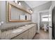 Bathroom boasts double sinks, granite countertops, modern fixtures, and ample vanity storage space at 4916 Kentwood Dr, Marietta, GA 30068