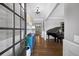 Elegant home entryway with hardwood floors, stylish console table, and open view to the formal living spaces at 4916 Kentwood Dr, Marietta, GA 30068