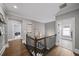 Upstairs hallway featuring elegant decor and hardwood floors, connecting the bedrooms and living areas at 4916 Kentwood Dr, Marietta, GA 30068