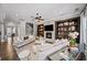 Bright living room with fireplace, built-in shelves, and comfortable seating at 4916 Kentwood Dr, Marietta, GA 30068