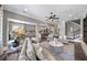 Spacious living room with open layout to kitchen, neutral colors, and hardwood floors at 4916 Kentwood Dr, Marietta, GA 30068