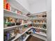 Walk-in pantry with lots of shelving, storage for food, and wood flooring at 4916 Kentwood Dr, Marietta, GA 30068