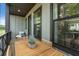 This outdoor balcony space features a table and chairs with views of the surrounding area at 525 Burlrush Ln # 16, Alpharetta, GA 30009
