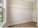 Walk-in closet with a window and wire shelving perfect for storage at 525 Burlrush Ln # 16, Alpharetta, GA 30009
