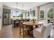 Well-appointed kitchen with modern appliances, a large island, and open access to a dining area at 525 Burlrush Ln # 16, Alpharetta, GA 30009