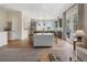 Bright living space with a view of the kitchen, dining area, and exterior access to the outside at 525 Burlrush Ln # 16, Alpharetta, GA 30009