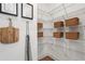 Walk-in pantry offers plenty of storage with wire racks and space for organizing your groceries at 525 Burlrush Ln # 16, Alpharetta, GA 30009