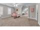 Spacious bedroom with two windows, a nook, and plush carpeting at 2914 Stanway Ave, Douglasville, GA 30135