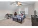 Cozy bedroom with carpeted floor, ceiling fan, and natural light at 2914 Stanway Ave, Douglasville, GA 30135