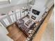 Bright living room with fireplace and ample seating, viewed from the second story at 2914 Stanway Ave, Douglasville, GA 30135