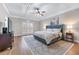Large main bedroom with tray ceiling, decorative rug, and large window for ample natural light at 2914 Stanway Ave, Douglasville, GA 30135