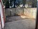 Backyard with privacy fence and paved area for outdoor enjoyment at 3228 Shadow Walk Ln, Tucker, GA 30084