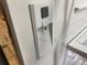 Close-up of a built-in water dispenser in a modern stainless steel refrigerator at 3228 Shadow Walk Ln, Tucker, GA 30084
