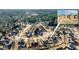 An aerial view of a neighborhood with a close-up of the property and surrounding houses at 502 Stoneland Pl, Lawrenceville, GA 30046