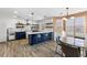 Beautiful kitchen with a large island, pendant lights, stainless steel appliances, and eat in kitchen table at 502 Stoneland Pl, Lawrenceville, GA 30046