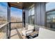 Enjoy the outdoors with this balcony that provides seating and a view of the surrounding area at 944 Spencer Ave, Atlanta, GA 30318