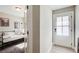Cozy bedroom with a daybed, carpet, and views of the front entrance at 944 Spencer Ave, Atlanta, GA 30318