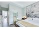 Spacious bedroom featuring a unique mountain mural and ample natural light at 944 Spencer Ave, Atlanta, GA 30318