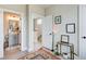 Hallway with open doorway to a bathroom and modern decor at 944 Spencer Ave, Atlanta, GA 30318