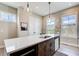 Bright kitchen island showcases a stainless steel sink, modern faucet and stylish hardware at 944 Spencer Ave, Atlanta, GA 30318
