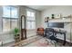 Bright office space featuring a large desk with dual monitors and natural light from two large windows at 944 Spencer Ave, Atlanta, GA 30318