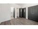 Bedroom features hardwood floors, neutral paint and closet space at 1106B Wedgewood Nw Dr, Atlanta, GA 30318