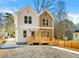 Attractive duplex featuring a front yard and individual entrances for each unit at 1106B Wedgewood Nw Dr, Atlanta, GA 30318