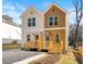 A well-maintained duplex with a front yard, featuring individual entrances for each unit at 1106B Wedgewood Nw Dr, Atlanta, GA 30318