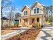 A modern duplex with dual entrances, surrounded by mature trees at 1106B Wedgewood Nw Dr, Atlanta, GA 30318