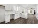 Well-lit kitchen with new appliances, ample counter space, and stylish luxury vinyl plank flooring at 1106B Wedgewood Nw Dr, Atlanta, GA 30318