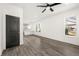 Bright, open-concept living area with modern floors, fresh paint, and ample natural light at 1106B Wedgewood Nw Dr, Atlanta, GA 30318