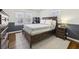 This bedroom features a neutral color palette, hardwood floors, and natural light at 3597 Embry Cir, Atlanta, GA 30341