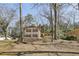 Charming two-story brick home with well-manicured lawn and mature trees at 3597 Embry Cir, Atlanta, GA 30341