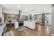 Beautiful kitchen boasts a center island and open concept at 3597 Embry Cir, Atlanta, GA 30341