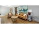 Comfortable living room with a fireplace, leather furniture, wood floors and decor at 3597 Embry Cir, Atlanta, GA 30341