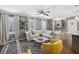 Spacious living room features neutral decor, hardwood floors, and open floor plan at 3597 Embry Cir, Atlanta, GA 30341