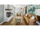 Cozy living room with hardwood floors, fireplace, and modern decor creates a warm, inviting atmosphere at 3597 Embry Cir, Atlanta, GA 30341