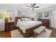 Spacious main bedroom featuring hardwood floors, natural light, and stylish furnishings at 3597 Embry Cir, Atlanta, GA 30341