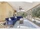 Bright sunroom with a comfortable seating area, skylights, a ceiling fan and lots of windows at 3597 Embry Cir, Atlanta, GA 30341