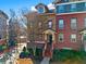 Charming townhouse with brick and siding, manicured landscaping, and inviting entryway at 655 Mead Se St # 7, Atlanta, GA 30312