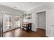 Kitchen area with stainless steel appliances, a wooden island, and outdoor access at 655 Mead Se St # 7, Atlanta, GA 30312